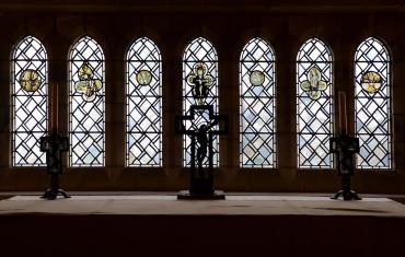 Fragments of medieval stained glass in the crypt Chapel of St Alban Roe